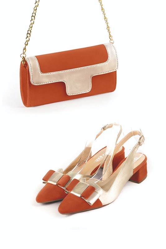 Women's terracotta orange and gold luxurious elegant clutch for ceremonies, weddings and evenings out. - Worn view